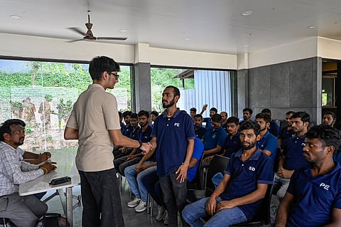 Vasishth Somani speaking to a group of people.