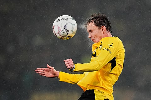 Dortmund's Maximilian Beier heads the ball during the German soccer cup match between Borussia Dortmund and Werder Bremen in Dortmund, Germany, Tuesday, Oct. 27, 2026.