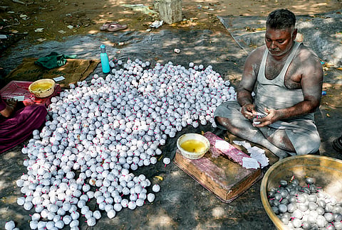A worker makes firecrackers for sale ahead of the ‘Diwali’ festival, at a factory unit in Ahmedabad, Monday, Oct. 19, 2026. 
