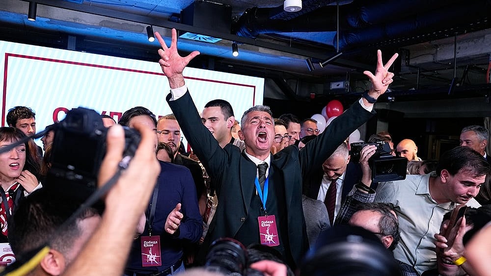 Students' List leader Ilija Srdanovic celebrates after Aleksandar Vucic, leader of the right-wing Serbian Progressive Party (SNS) conceded defeat in the parliamentary election in Belgrade - | Photo: AP/Petr David Josek