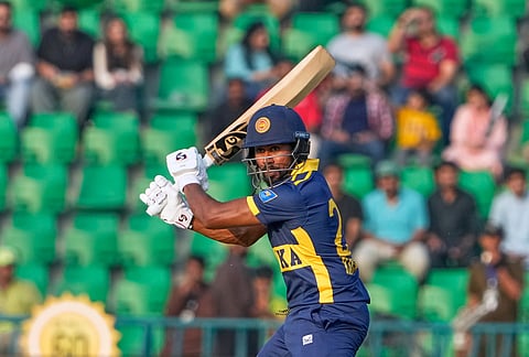Sri Lanka's Kamindu Mendis follows the ball after playing a shot for boundary during the tri-series one-day international cricket match between Pakistan and Sri Lanka, in Lahore, Pakistan, Tuesday, Oct. 27, 2026.