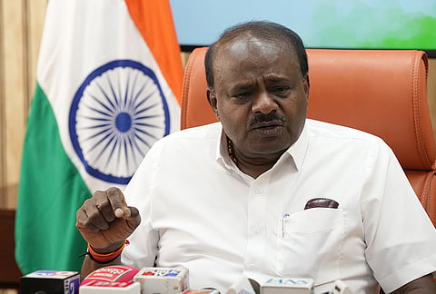 Union Minister H D Kumaraswamy addresses a press conference on the alleged sting operation controversy involving former Karnataka chief minister Siddaramaiah, in New Delhi. 