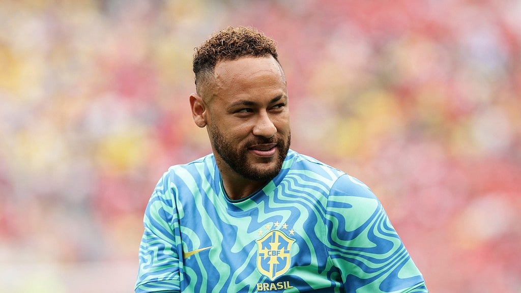 Brazil's Neymar looks on during the warm up ahead the World Cup round of 16 soccer match between Brazil and Norway in East Rutherford, N.J. - Adam Hunger/AP Photo