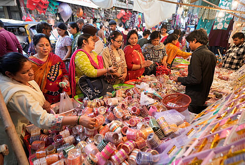 Women buy bangles in preparation for the Hindu festival of Karva Chauth in Jammu, India, Wednesday, Oct. 28, 2026. 
