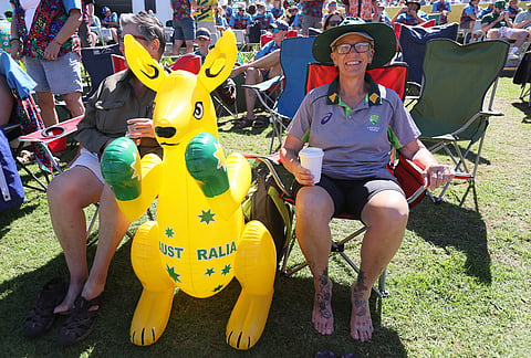 Supporters attend on day two of the third cricket test match between South Africa and Australia, in Cape Town, South Africa, Wednesday, Oct. 28, 2026. 