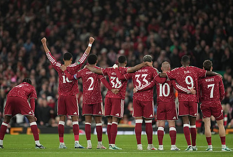 Liverpool players watch penalty shotout during the fourth-round English Football League Cup soccer match between Liverpool and Chelsea in Liverpool, England, Wednesday, Oct. 28, 2026. 