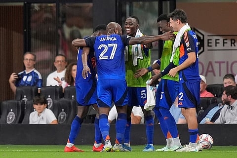 FC Cincinnati players including FC Cincinnati midfielder Obinna Nwobodo (5) celebrate their side's second goal during the second half of an MLS soccer match against Inter Miami, Wednesday, Oct. 28, 2026, in Miami. 