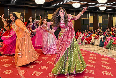 Women celebrate on the eve of 'Karva Chauth' festival, in Ahmedabad, Gujarat, Wednesday, Oct. 28, 2026. 
