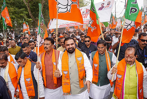 Bihar Chief Minister Samrat Choudhary and BJP state President Sanjay Saraogi take part in the 'Loktantra Bachao Arajakta Hatao' padyatra, in Patna, Wednesday, Oct. 28, 2026. 
