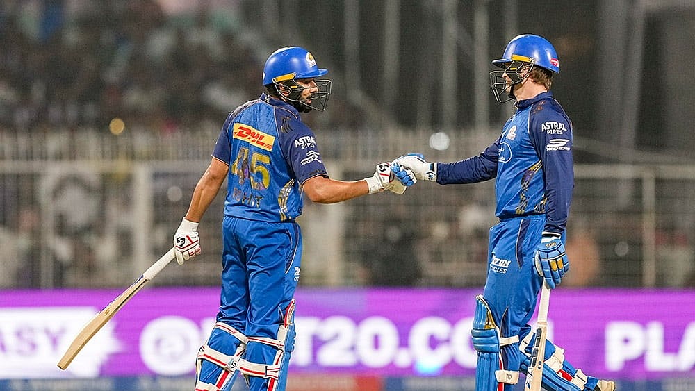 Mumbai Indians' Ryan Rickelton, right, and Rohit Sharma during the Indian Premier League (IPL) 2026 T20 cricket match between Kolkata Knight Riders and Mumbai Indians, in Kolkata, West Bengal. - | Photo: PTI/Swapan Mahapatra