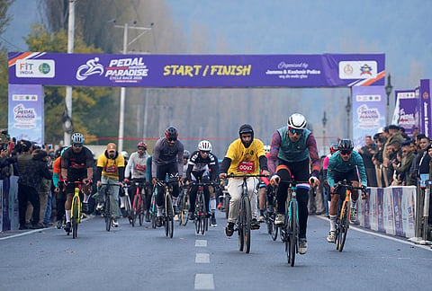People take part in a cycle race titled 'Pedal Through Paradise' organised by the Jammu and Kashmir Police, in Srinagar, Thursday, Oct. 29, 2026. 