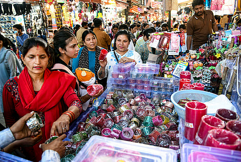 Women shop for bangles ahead of the 'Karva Chauth' festival, in Dehradun, Uttarakhand, Tuesday, Oct. 27, 2026. 
