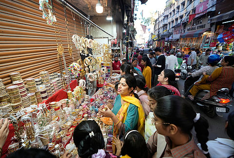 Women shop on the eve of the Karva Chauth festival in Jammu, India, Wednesday, Oct. 28, 2026. 
