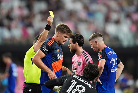 Inter Miami forward Lionel Messi (10) is shown a yellow card during the first half of an MLS soccer match, Wednesday, Oct. 28, 2026, in Miami. 
