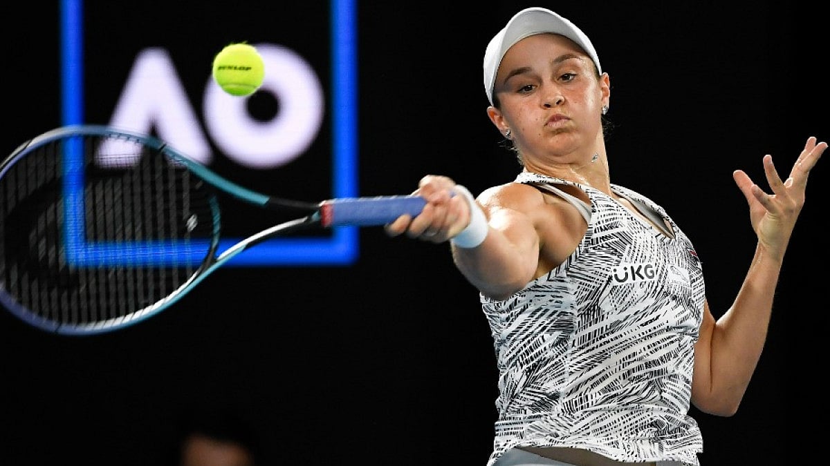 Ashleigh Barty plays a forehand return to Madison Keys at Australian Open 2022. 