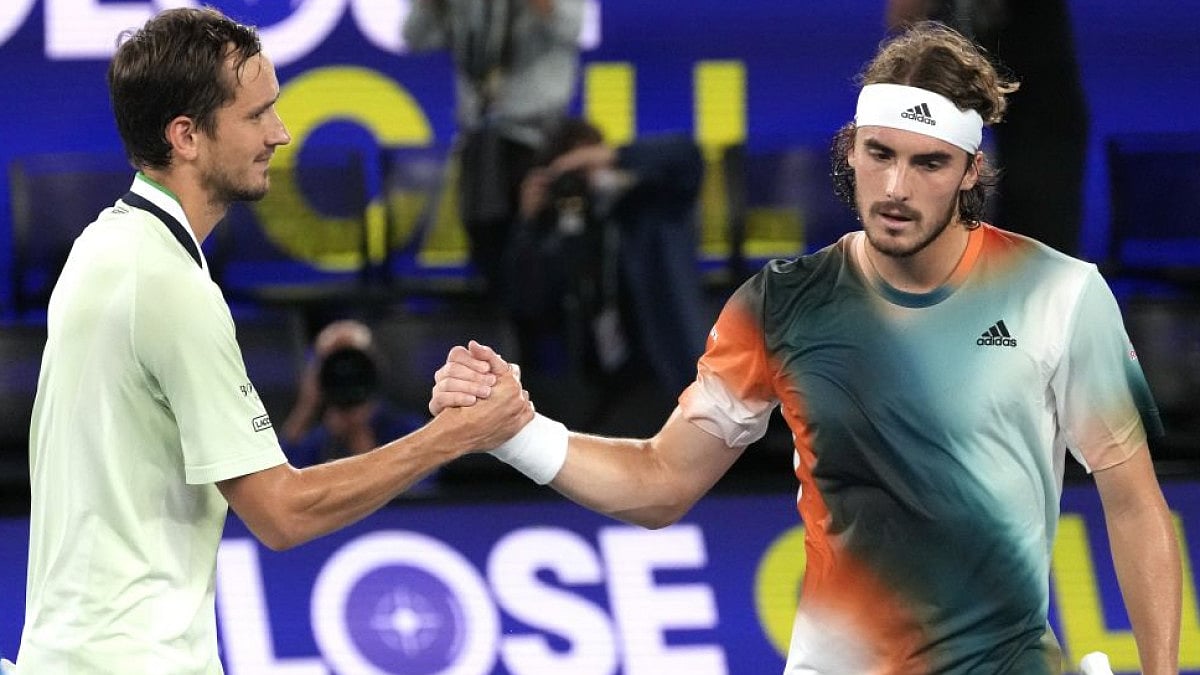 Daniil Medvedev (L) congratulated by Stefanos Tsitsipas after Australian Open 2022 semifinal match.
