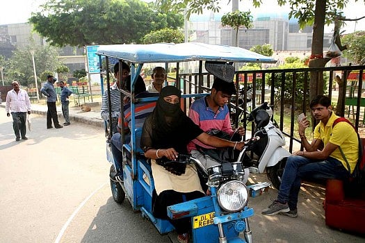 Meet The Lone Muslim Woman E-Rickshaw Driver in East Delhi