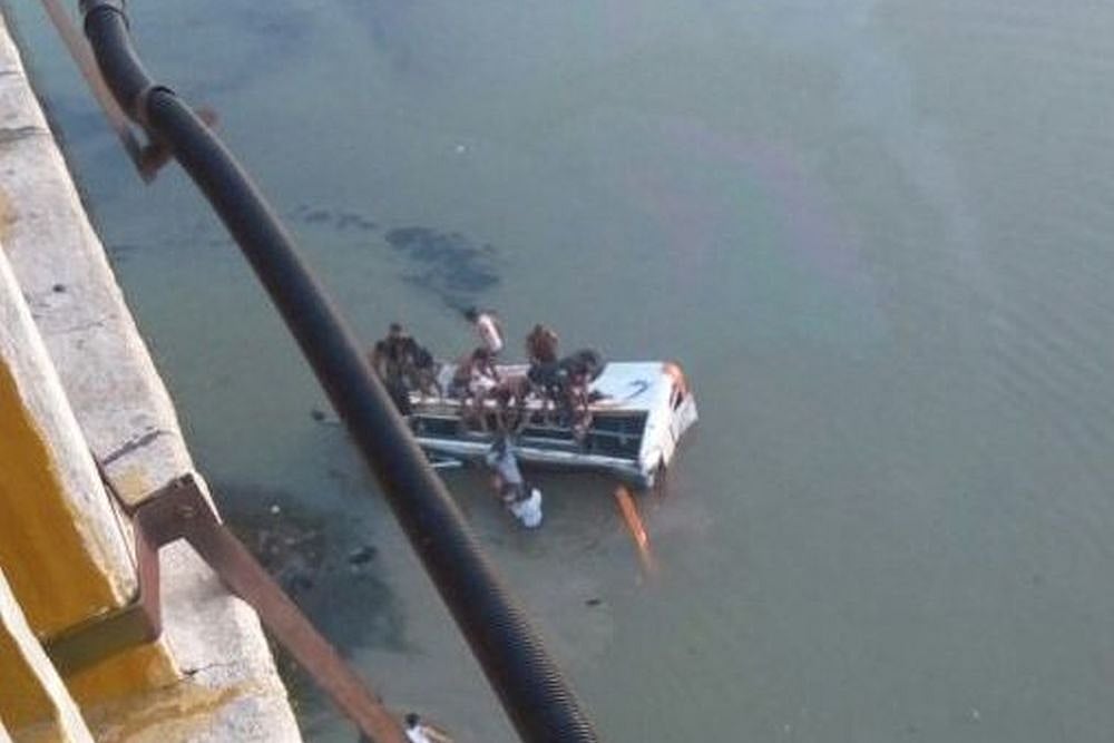 Bus carrying worshippers plunges off a  bridge on a mountain pass 