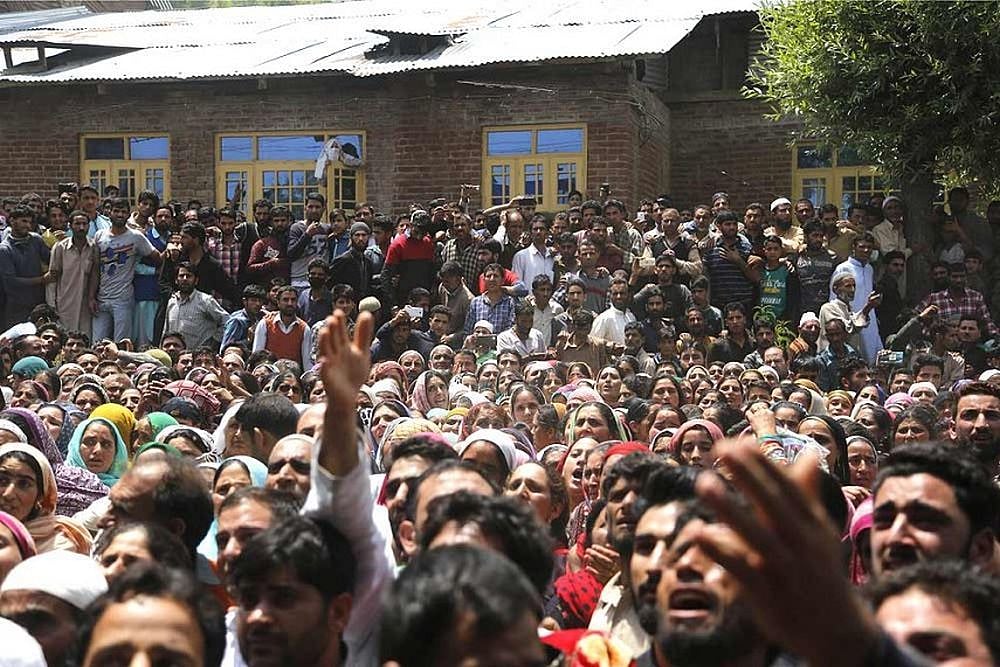 A Militants Poster, Charred Houses, Grief And Anguish: Life In Kashmir Village Two Days After Encounter