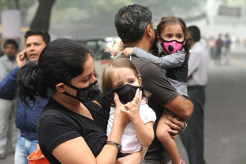People protect children with masks