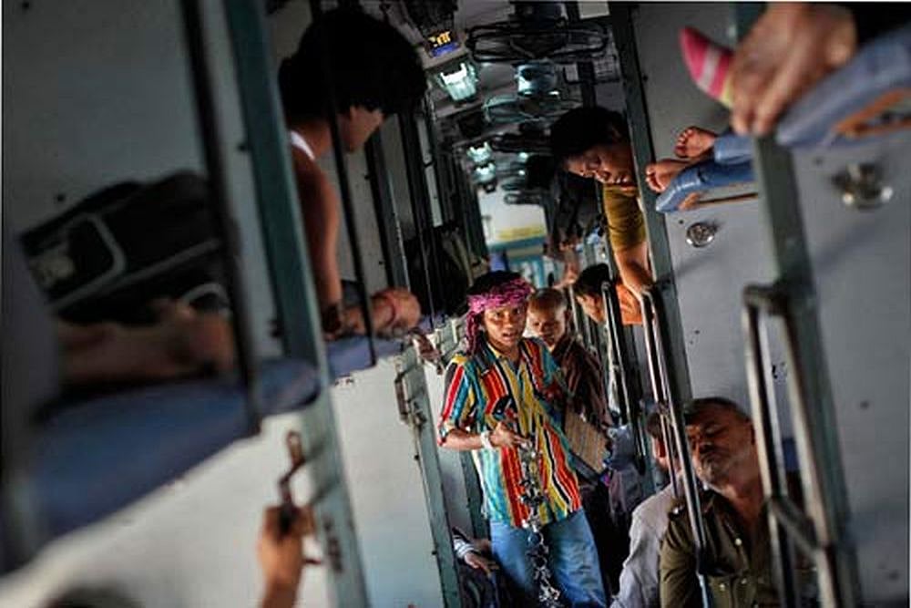Snoring Passenger On Train Gets 'Sound' Punishment From Fellow Travelers