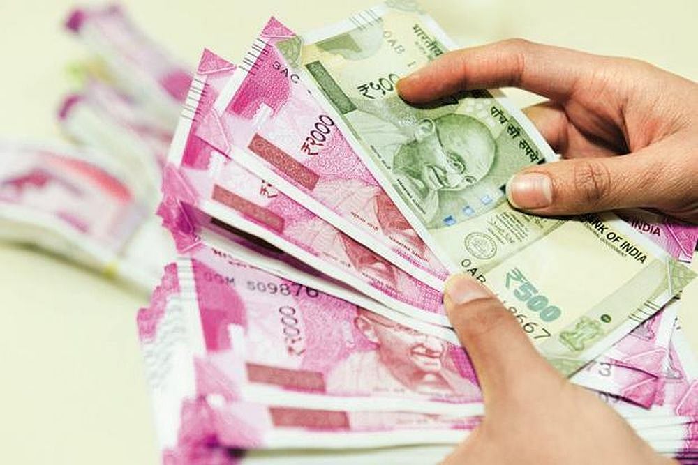 Security Personnel Seize Rs 75 Lakh Cash At Bhubaneswar Airport