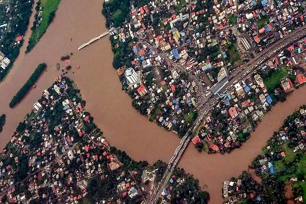 Two cyclonic systems cause severe floods in Kerala and Assam.
