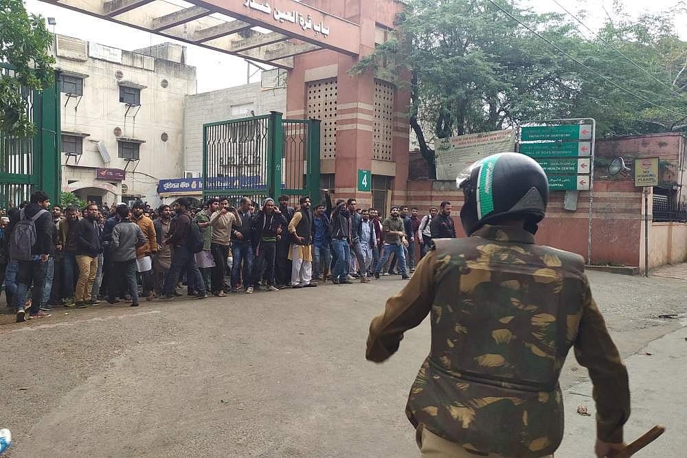 Students of Jamia Milia Islamia University hold protest against Citizenship (Amendment) Bill in New Delhi.