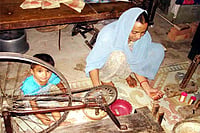 Poverty, Malnutrition, Disease Stalk Weavers Of Benaras