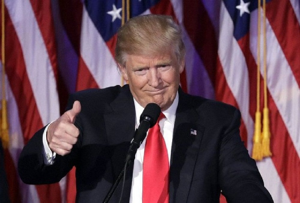 File Photo : When asked whether his visit would take place next year, Trump responded, “It could be, yeah.”