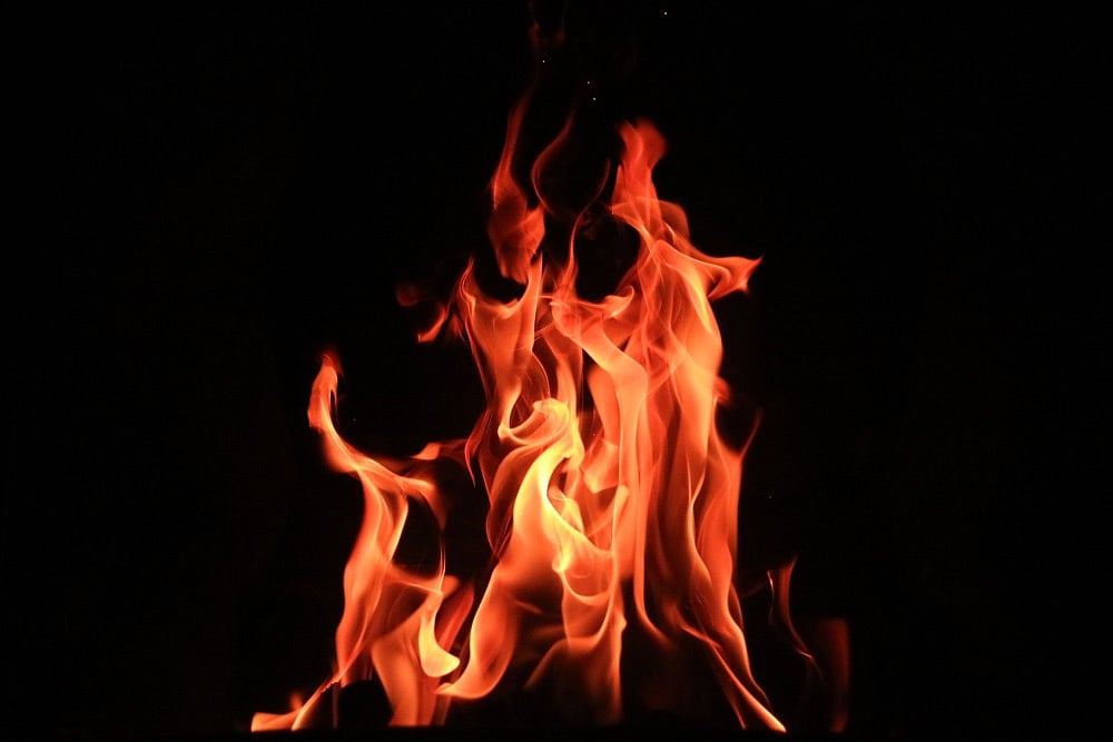 man sets son and family on fire (Representational image)