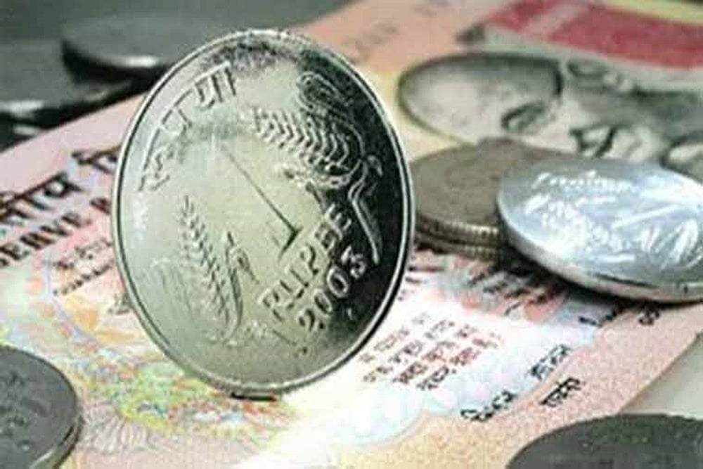 Rupee Opens On Flat Note Against US Dollar
