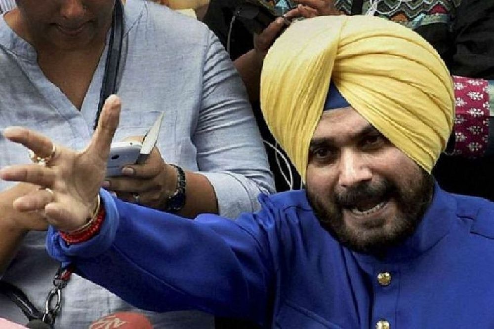 AAP, BJP Slam Congress Over Navjot Kaur Sidhus ₹500 Crore Suitcase Post