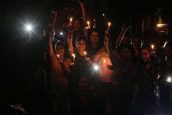 Clapping And Lighting Lamps Maybe Uplifting, But It's Mere Symbolism