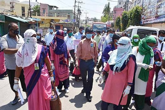 Anganwadi workers and medics during a door-to-door survey, to screen people for COVID 19 symptoms, during the nationwide lockdown imposed in the wake of the coronavirus outbreak