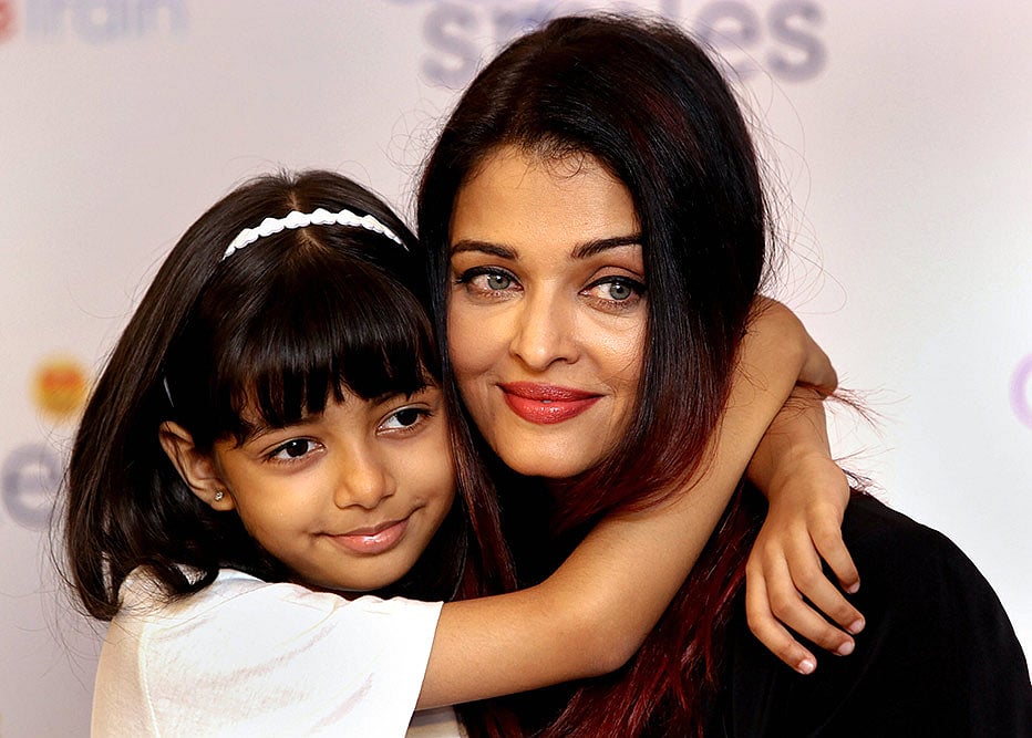 Bollywood actor Aishwarya Rai Bachchan poses with her daughter Aaradhya Bachchan during an event for NGO Smile Train India in Mumbai.