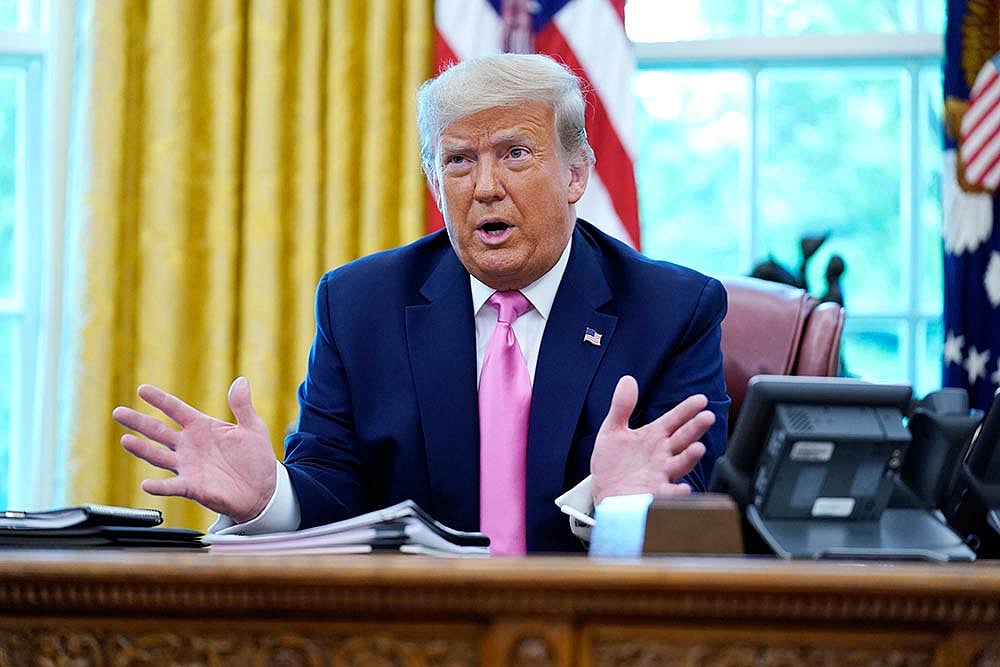 AP : Donald Trump praising Friedrich Merz