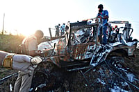 Freeze Frames In Lakhimpur Kheri: A Charred SUV, Toys On A Cart And A Young Man In A Red T Shirt Freeze Frames In Lakhimpur Kheri: A Charred SUV, Toys On A Cart And A Young Man In A Red T Shirt
