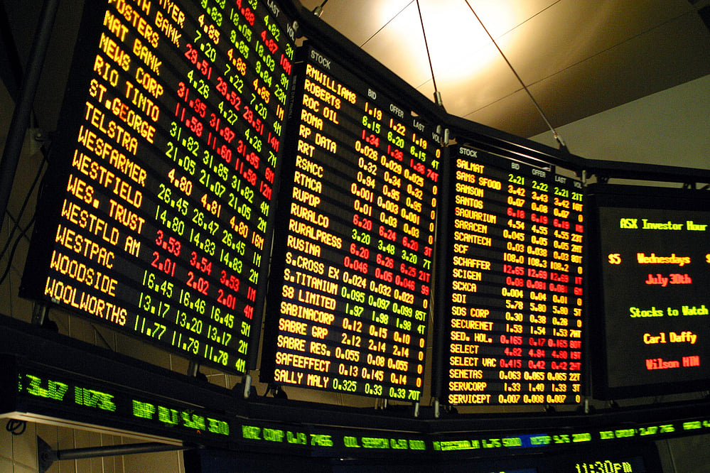 Asian stock markets mixed after Wall St hits record again