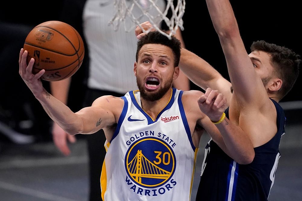 Stephen Curry was out with a partially dislocated left shoulder for the Warriors.