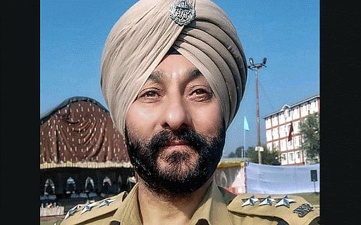 J-K Dismisses Cop Charged With Terror Links