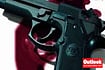 Four armed assailants hold staff at gunpoint in broad daylight, loot cash stored in a cupboard, and escape in a car parked near Old Delhi Railway Station.