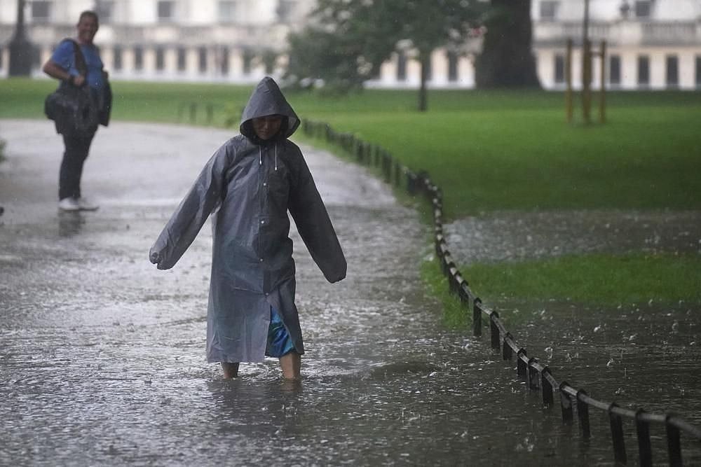 London Cleans Up After Torrential Rains Wreak Havoc