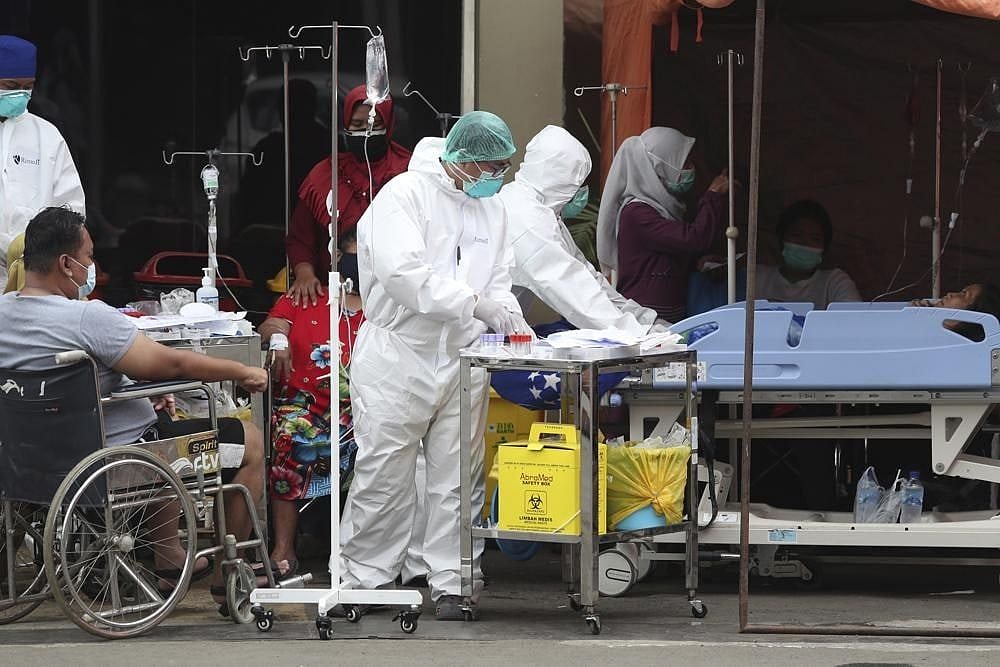 Indonesia Struggles With Covid-19 Surge Amid Slow Vaccine Rollout