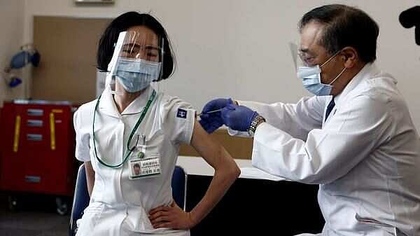 Japan Races To Vaccinate As Virus Surges After Olympics