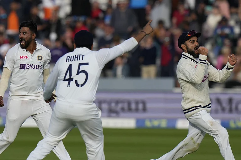 Virat Kohli (R) won't be featuring in the second Test - AP/File Photo