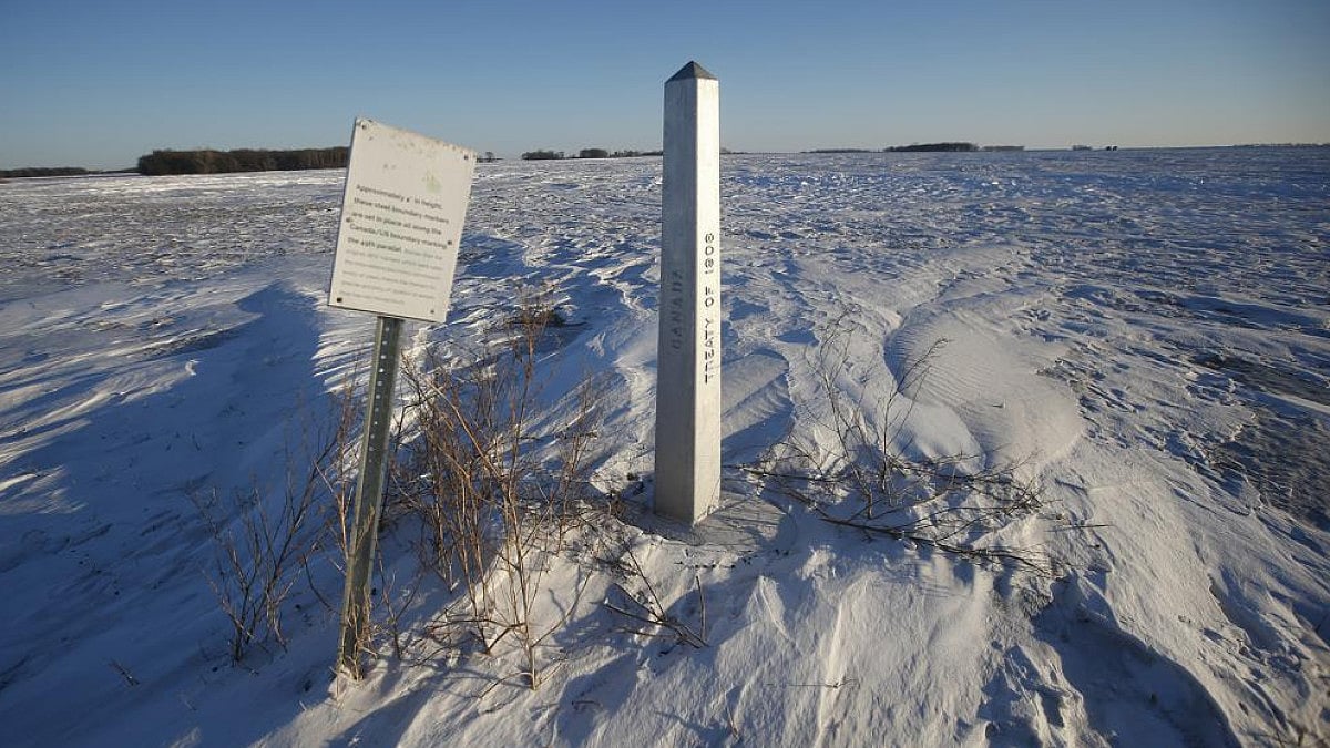 A US-Canada border marker near Emerson | Image credit: AP
