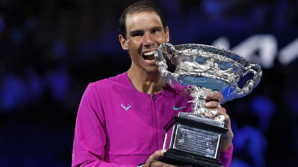 Rafael Nadal holds the Norman Brookes Challenge Cup after winning Australian Open 2022.