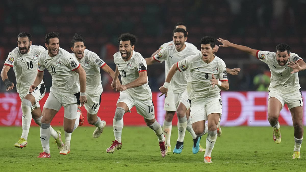 Egypt players celebrate after beating Cameroon in the Africa Cup of Nations 2022 semifinal.