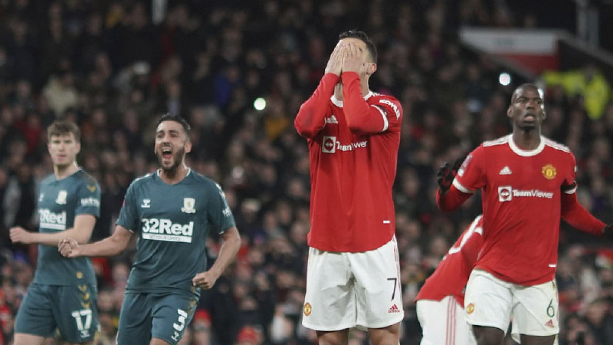 Manchester United's Cristiano Ronaldo reacts after missing a penalty.